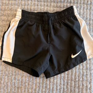 Nike Black Shorts with White Side Panels and Swoosh
